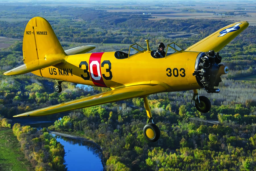 Matt Quy banks Ed and Dustin Newberg's Timm N2T-1 Tutor above the Minnesota countryside. The N2T-1 is a relatively unknown World War II primary trainer, eclipsed by the far more numerous Fairchild PT-19, PT-23 and PT-26 as well as the Ryan PT-22.