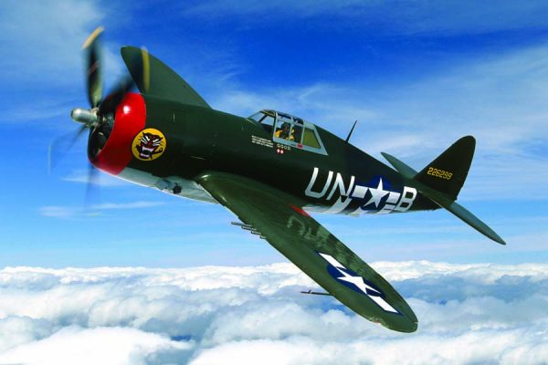 The world’s only flying example of the type, the Planes of Fame P-47G bears down on the camera ship with Steve Hinton at the controls in the airspace south of Chino Airport. It was temporarily painted for this photoshoot to represent Lt. Cameron Hart’s UN-B 63rd FS Razorback based at Halesworth, England, in 1944 with the 56th FG. (Photo by John Dibbs/Facebook.com/theplanepicture)