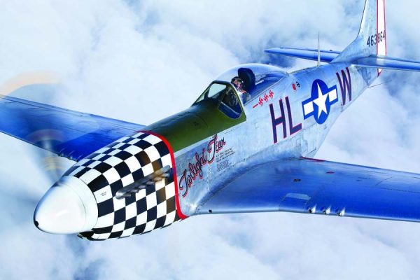 Resplendent in 78th Fighter Group colors, the Fagen Fighters WW II Museum’s P-51D hugs the camera ship with Brian Smith behind the stick. (Photo by John Dibbs/Facebook.com/theplanepicture)