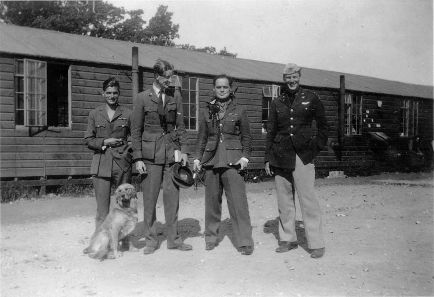 From left to right: “Johnnie” Johnson, Hugh “Cocky” Dundas, the legless Douglas Bader, and Lieutenant Montgomery, an American officer who was visiting their airfield at Westhampnett. This photo was taken before August, 1941, four months before Germany declared war on America. 