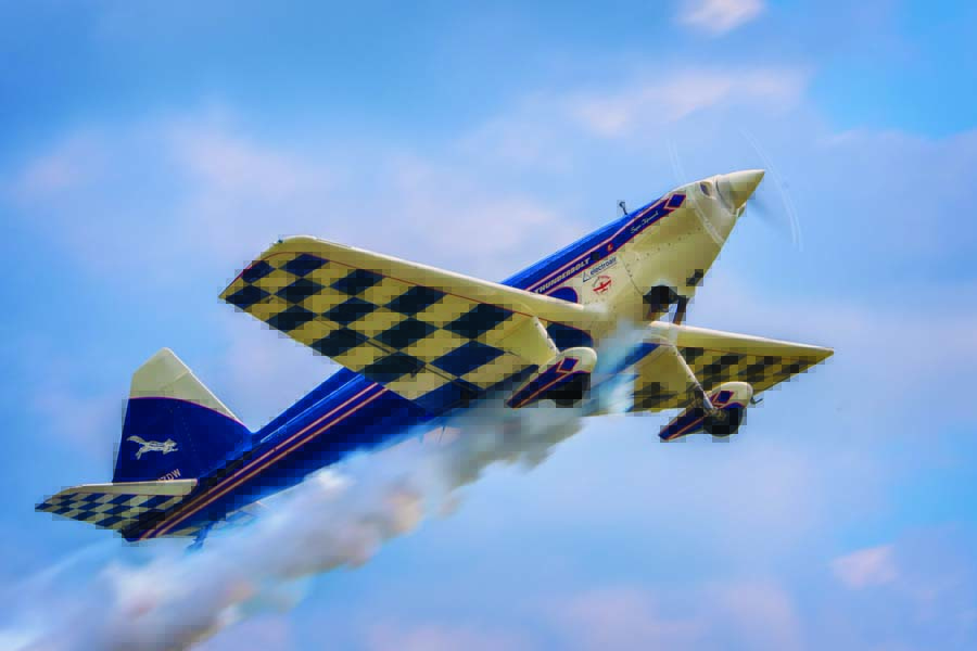 Mark Meredith zooms skyward in "Chippy," his 1951 DeHavilland Super Chipmunk. Now performing on the American airshow circuit with Meredith, the transformed RAF trainer has built a following in both the southern and northern hemispheres over seven decades in action.
