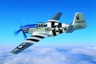 Stephen Gray soars over Duxford, England in The Fighter Collection’s “Princess Elizabeth” North American P-51C Mustang in invasion livery. This Mustang is now owned by Dan Friedkin of Houston, Texas and his Air Force Heritage Flight Foundation. (Photo by John Dibbs/Facebook.com/theplanepicturecompany)