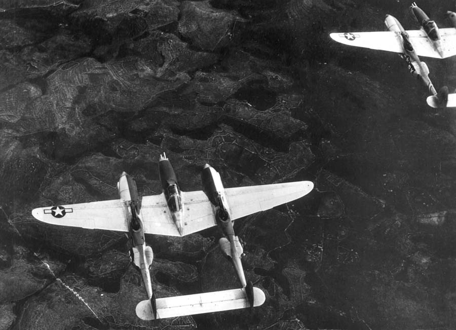 An 82nd FG P-38 heads out to another target from its base in Foggia, Italy. (Photo courtesy of Jack Watson via Warren Thompson.)