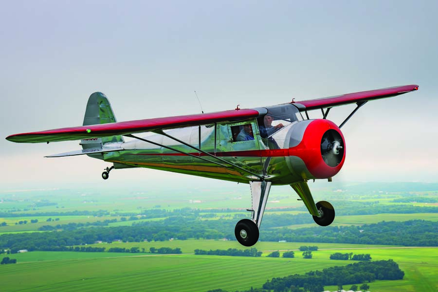 Father and son duo Ron (left) and Chris Price enjoy some stick time in their ultra-rare Luscombe Model 4. (Photo by Connor Madison/EAA)