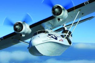 Flown by Paul Mulcahy and Derek Head, the Catalina Society/Plane Sailing’s PBY-5A Catalina G-PBYA “Miss Pickup” flies toward the North Sea from Duxford, England.(Photo by John Dibbs/Facebook.com/theplanepicture)