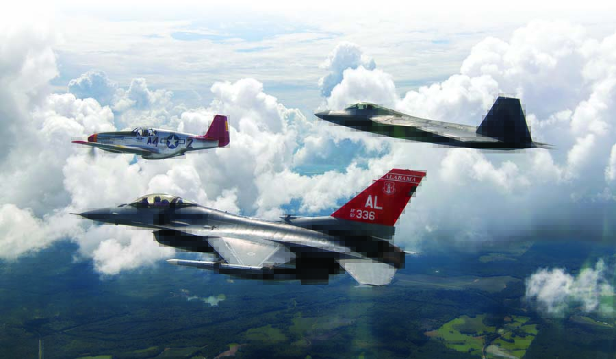 A P-51C from the Commemorative Air Force’s Red Tail Squadron leads a USAF Heritage Flight with an Alabama Air National Guard F-16C from the 100th Fighter Squadron on its left wing and an F-22 from the 325th Fighter Wing at Tyndall AFB on its right wing. (USAF photo)