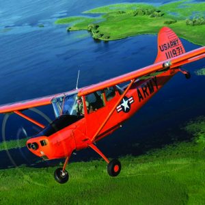 After being damaged during glider towing in 1986, this Bird Dog was rebuilt as a warbird using its original U.S. Army serial number (51-11971). With owner Michael Weinfurter at the controls, it stands out against the Wisconsin landscape. (Photo by David Leininger)